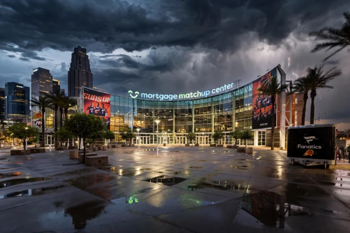 Phoenix Suns arena in downtown Phoenix under dark storm clouds